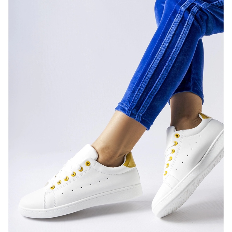 Zapatillas Bushnell blancas con detalles en amarillo. blanco 1