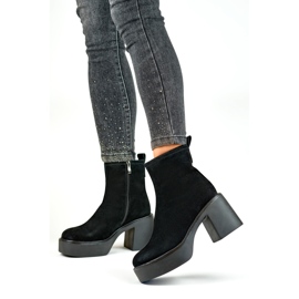 Botines de mujer negros elaborados en piel natural con plataforma de tacón 4