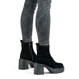 Botines de mujer negros elaborados en piel natural con plataforma de tacón 5