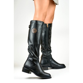 Botines de mujer con cremallera dorada. negro 4