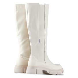 Botas de mujer beige con parte superior flexible. 4