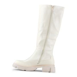 Botas de mujer beige con parte superior flexible. 3