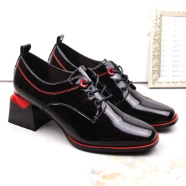 Zapatos de mujer de charol negro sobre bloque de Filippo 2