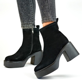 Botines de mujer negros elaborados en piel natural con plataforma de tacón 8