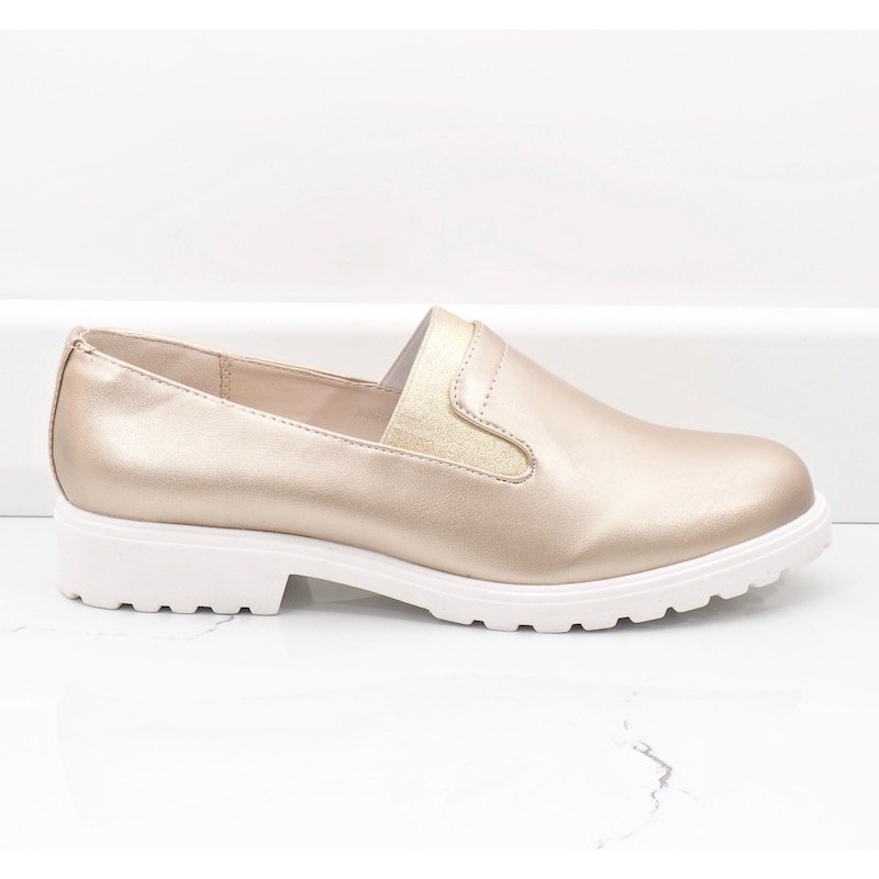 Zapatos dorados de plataforma 2025