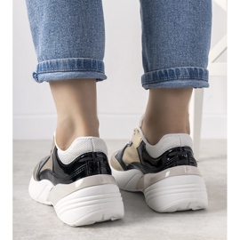 Deportivas doradas con suela alta Rude negro 2