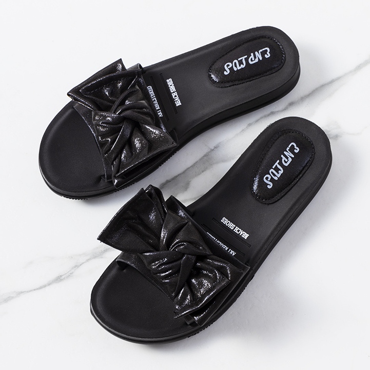 BM Babuchas negras con lazo brillante Sora negro 1