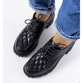 Zapatos de tacón negros de Landra. 1