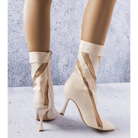 Botas beige con inserciones transparentes de Jay 1