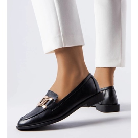 Mocasines negros con hebilla de Henrique 1