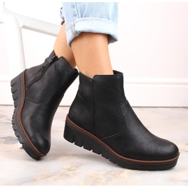 Botas de cuña de mujer cómodas y aislantes en color negro Rieker X9165-00 1
