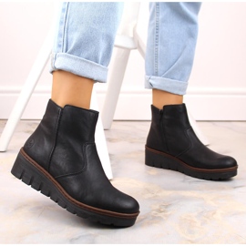 Botas de cuña de mujer cómodas y aislantes en color negro Rieker X9165-00 2