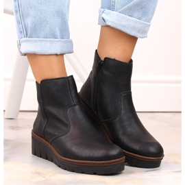 Botas de cuña de mujer cómodas y aislantes en color negro Rieker X9165-00 3