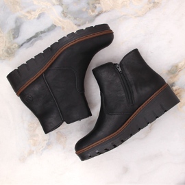 Botas de cuña de mujer cómodas y aislantes en color negro Rieker X9165-00 6
