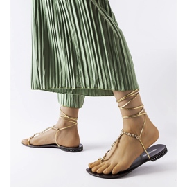 Sandalias doradas con pedrería de Troghi dorado 1