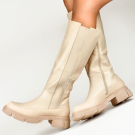 Botas de mujer beige con parte superior flexible. 6