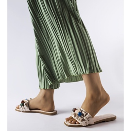 Chanclas beige con volantes de Fortier negro 1