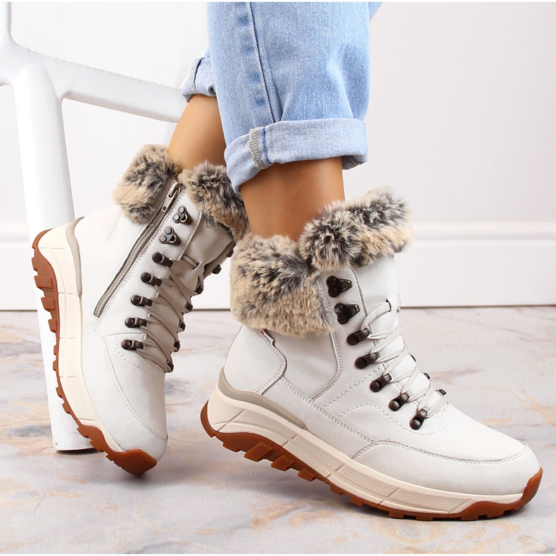 Botines de mujer impermeables de piel con aislamiento de lana, blanco Rieker W0063-80 1 Botines de mujer impermeables de piel con aislamiento de lana, blanco Rieker W0063-80 1