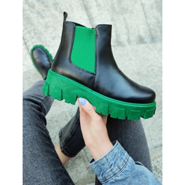 Botas de trabajo de mujer con suela verde. negro 10
