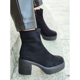 Botines de mujer negros elaborados en piel natural con plataforma de tacón 9