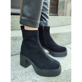 Botines de mujer negros elaborados en piel natural con plataforma de tacón 1