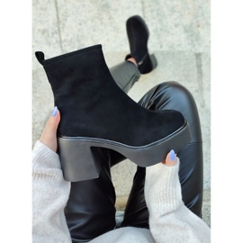 Botines de mujer negros elaborados en piel natural con plataforma de tacón 2 Botines de mujer negros elaborados en piel natural con plataforma de tacón 2