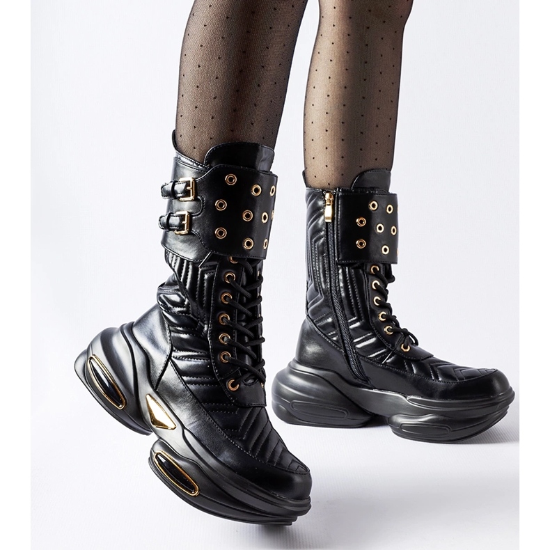 Botines negros decorados con pespuntes veroneses 1