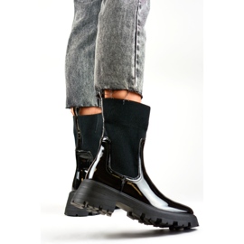 Zapatos negros de charol para trabajadores con parte superior flexible. 5