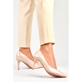 Tacones bajos de mujer en polvo. beige 1 Tacones bajos de mujer en polvo. beige 1