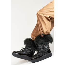 Botas de nieve de mujer negras con pelo decorativo. negro 5