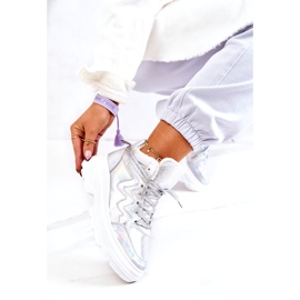 Zapatos deportivos aislados de plata de mujer 5