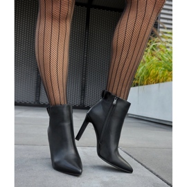 Botines negros con volante sobre stiletto Roger 1