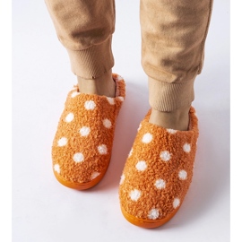 Pantuflas calentitas naranjas con lunares blancos. 2