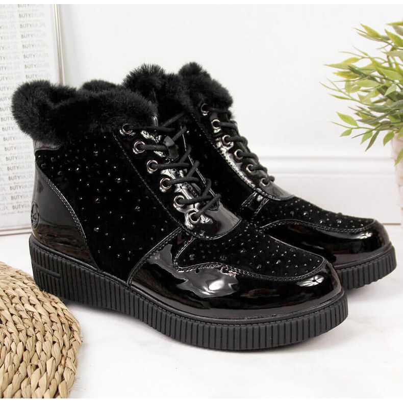 Botas de cuero con aislamiento de cuero negro Rieker 93312-00 en la plataforma 1