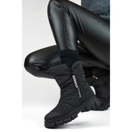 Botas de nieve altas de mujer en color negro. 1