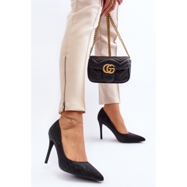 Tacones Klonisa negros decorados con purpurina. 5