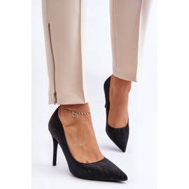 Tacones Klonisa negros decorados con purpurina. 7