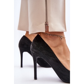 Tacones Klonisa negros decorados con purpurina. 8