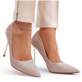Tacones altos con purpurina dorada de Tiberon dorado 8