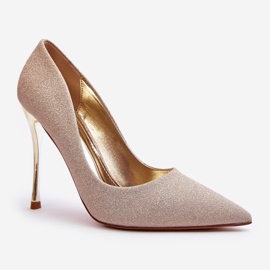 Tacones altos con purpurina dorada de Tiberon dorado 1