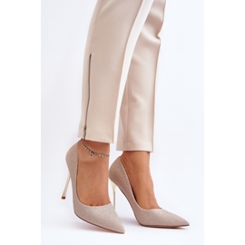 Tacones altos con purpurina dorada de Tiberon dorado 2