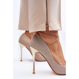 Tacones altos con purpurina dorada de Tiberon dorado 5