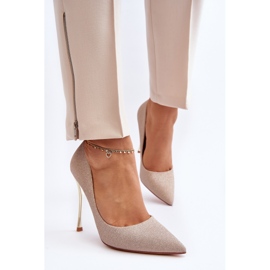 Tacones altos con purpurina dorada de Tiberon dorado 6