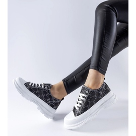 Zapatillas negras decoradas con el monograma de Antonella. negro 1