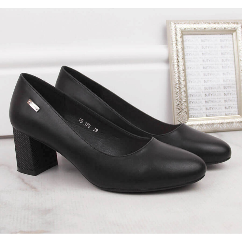 Bombas negras en un poste decorativo de Sergio Leone negro 2