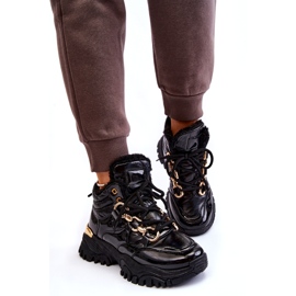 Zapatos deportivos aislados para mujeres botas de montaña con una cadena dorada negra negro 4