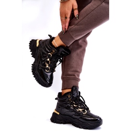 Zapatos deportivos aislados para mujeres botas de montaña con una cadena dorada negra negro 3