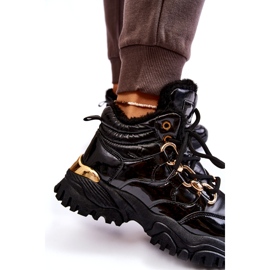 Zapatos deportivos aislados para mujeres botas de montaña con una cadena dorada negra negro 7