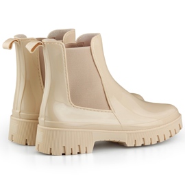 Botas de agua de mujer beige con suela gruesa. 1 Botas de agua de mujer beige con suela gruesa. 1