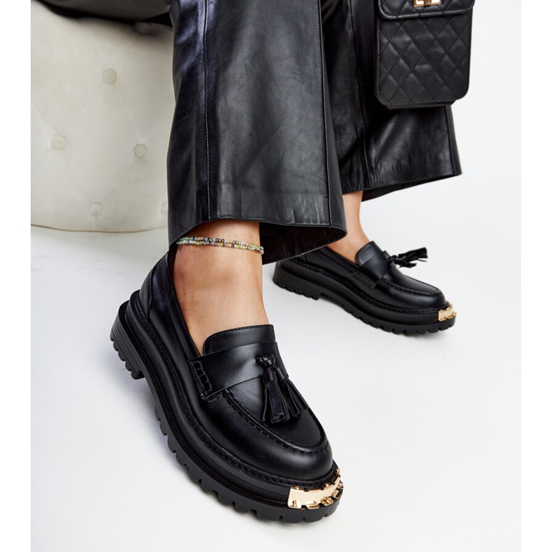 Mocasines macizos negros con inserciones doradas Tuga 1